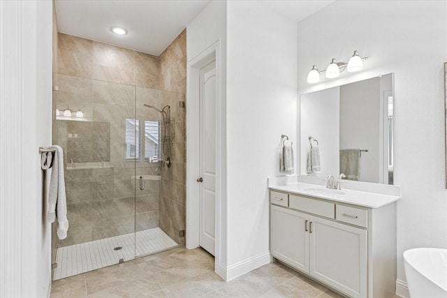806 Placid Way, Argyle, TX 76226 - bathroom featuring a shower stall, vanity, a freestanding tub, baseboards, and tile patterned floors