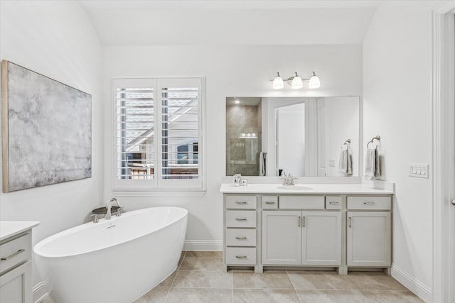 806 Placid Way, Argyle, TX 76226 - full bath with a stall shower, vanity, a soaking tub, and tile patterned floors