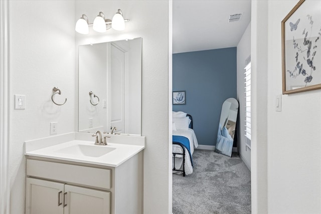 806 Placid Way, Argyle, TX 76226 - bathroom with connected bathroom, vanity, and baseboards
