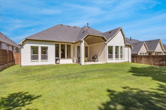 806 Placid Way, Argyle, TX 76226 - back of house featuring a patio, brick siding, and a shingled roof