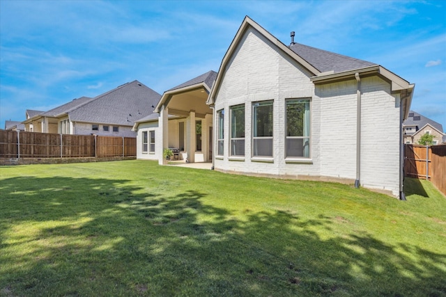 806 Placid Way, Argyle, TX 76226 - back of house with brick siding, a patio, and a shingled roof
