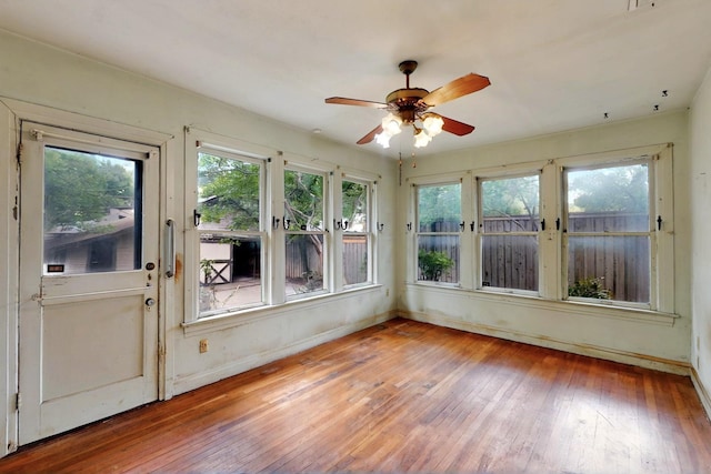 1022 N Edgefield Ave, Dallas, TX 75208 - unfurnished sunroom with healthy amount of natural light