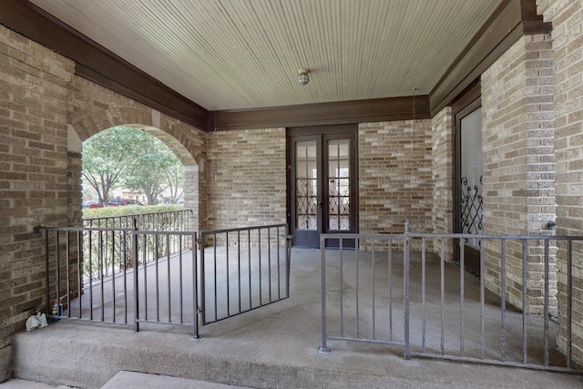 1022 N Edgefield Ave, Dallas, TX 75208 - entrance to property with french doors and brick siding