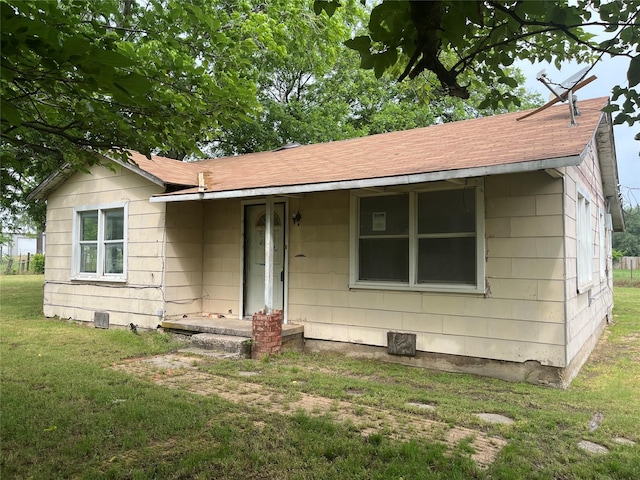 3743 State Highway 59 N, Bowie, TX 76230 - bungalow-style home with a front yard and a shingled roof