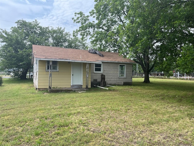 3743 State Highway 59 N, Bowie, TX 76230 - rear view of property with a lawn