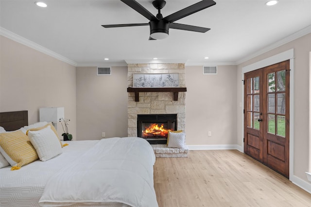 6701 Fish Pond Rd, Waco, TX 76710 - bedroom with french doors, ornamental molding, recessed lighting, light wood finished floors, and baseboards