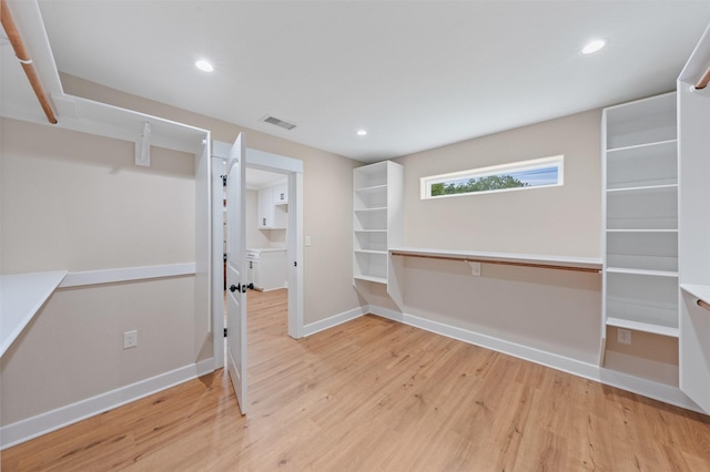 6701 Fish Pond Rd, Waco, TX 76710 - below grade area featuring light wood-style floors, baseboards, and recessed lighting