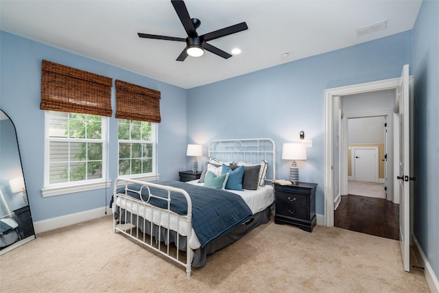 812 Baker St, Mckinney, TX 75069 - carpeted bedroom with baseboards and ceiling fan