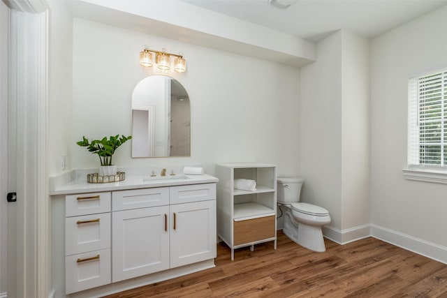 812 Baker St, Mckinney, TX 75069 - bathroom featuring vanity and wood finished floors