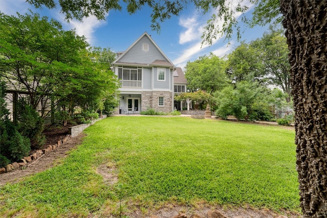 812 Baker St, Mckinney, TX 75069 - back of property featuring a lawn and french doors