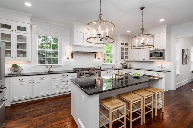 812 Baker St, Mckinney, TX 75069 - kitchen featuring a chandelier, high quality appliances, ornamental molding, decorative backsplash, and white cabinets
