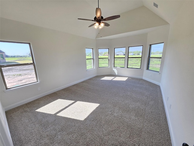 320 Magnolia Ct, Trenton, TX 75490 - spare room featuring carpet, ceiling fan, baseboards, and lofted ceiling