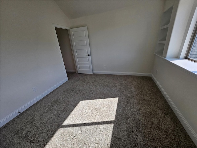 320 Magnolia Ct, Trenton, TX 75490 - unfurnished room with carpet, baseboards, and vaulted ceiling