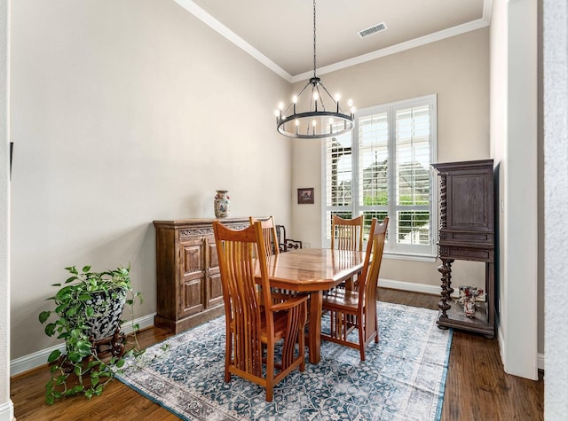 3021 Sunny Hill Ln, Prosper, TX 75078 - dining space featuring a chandelier, baseboards, wood finished floors, and crown molding