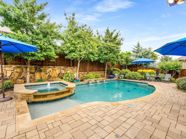 3021 Sunny Hill Ln, Prosper, TX 75078 - view of pool featuring a patio area, a fenced backyard, and a pool with connected hot tub