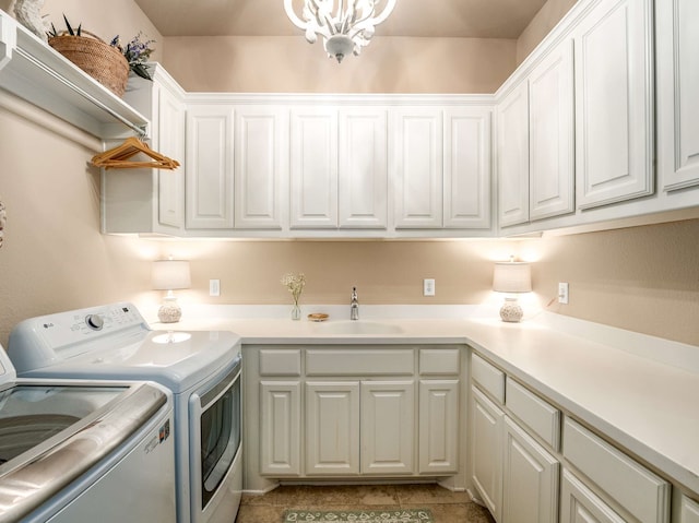 3021 Sunny Hill Ln, Prosper, TX 75078 - clothes washing area featuring washing machine and dryer, cabinet space, and tile patterned floors