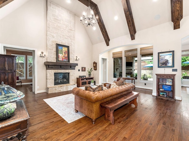 3021 Sunny Hill Ln, Prosper, TX 75078 - living area featuring a stone fireplace, high vaulted ceiling, wood finished floors, baseboards, and beam ceiling