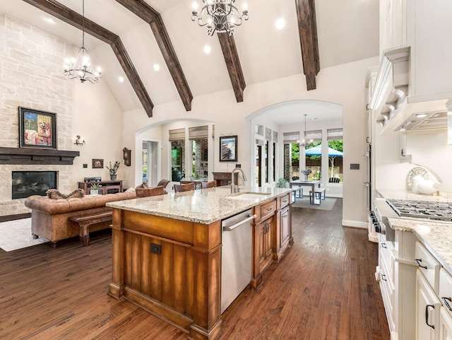 3021 Sunny Hill Ln, Prosper, TX 75078 - kitchen with a chandelier, arched walkways, high vaulted ceiling, beam ceiling, and recessed lighting