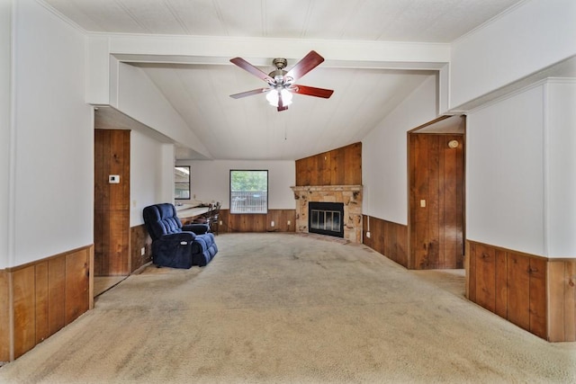 30 The Rdg, Corinth, TX 76210 - living area with wooden walls, carpet flooring, lofted ceiling, a wainscoted wall, and ceiling fan