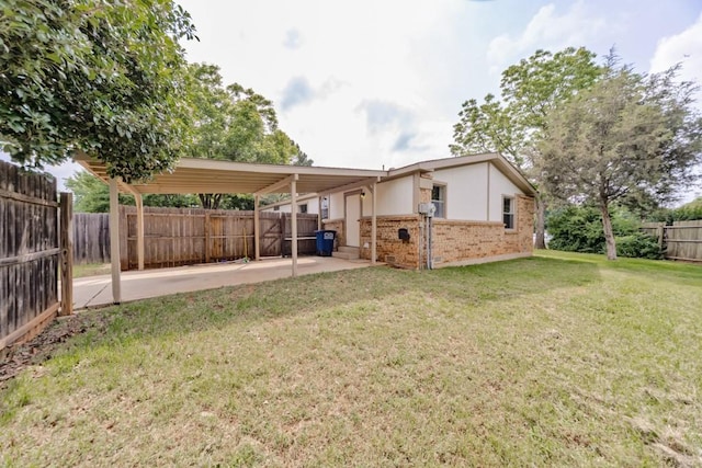 30 The Rdg, Corinth, TX 76210 - rear view of house with a patio area and brick siding