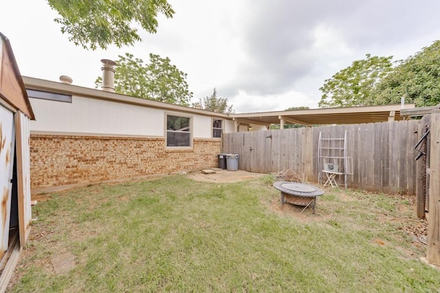 30 The Rdg, Corinth, TX 76210 - view of yard featuring an outdoor fire pit