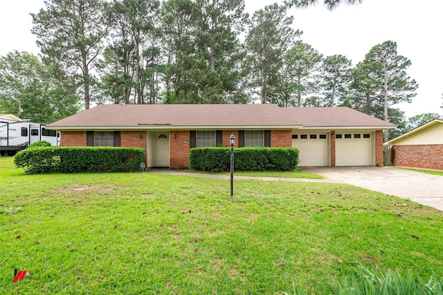 5023 Dedman Dr, Shreveport, LA 71107 - single story home featuring an attached garage, brick siding, concrete driveway, and a front lawn