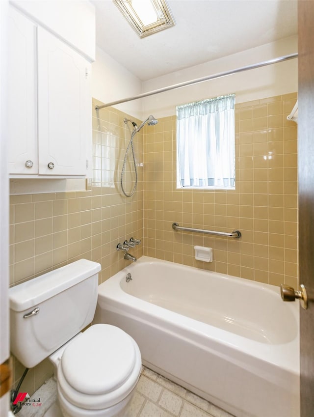 5023 Dedman Dr, Shreveport, LA 71107 - bathroom with toilet, shower / bath combination, and tile walls