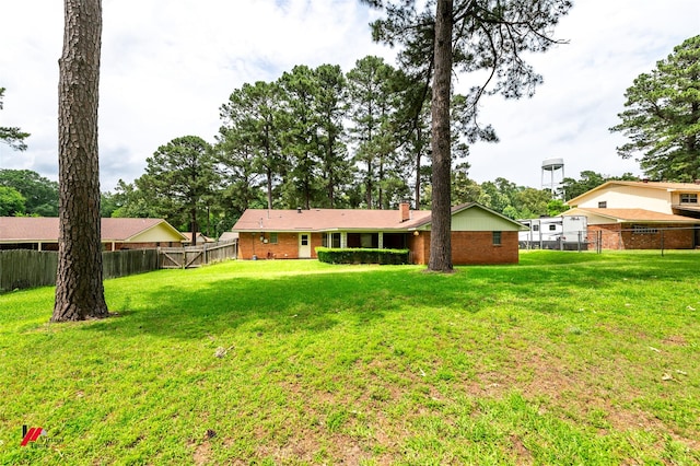 5023 Dedman Dr, Shreveport, LA 71107 - back of house with brick siding and a chimney