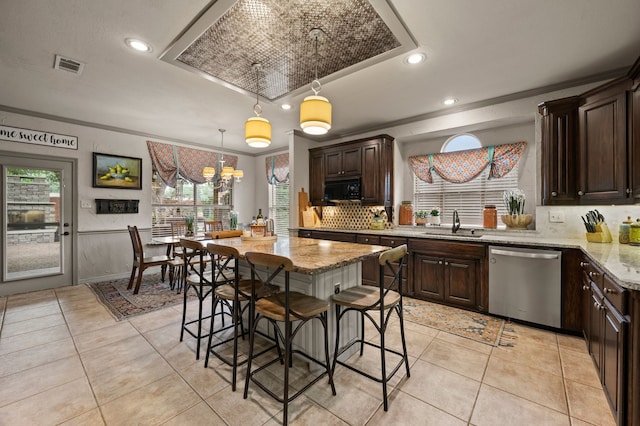 4213 Fairway Crossing Dr, Fort Worth, TX 76137 - kitchen with stainless steel dishwasher, black microwave, a sink, backsplash, and dark brown cabinets