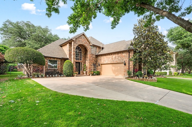4213 Fairway Crossing Dr, Fort Worth, TX 76137 - traditional-style house featuring brick siding, a shingled roof, an attached garage, and concrete driveway