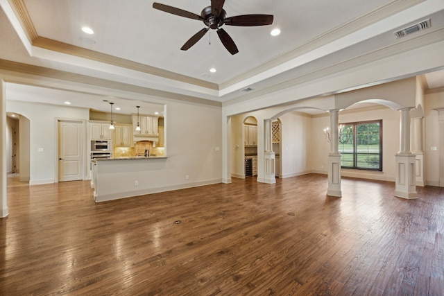 301 Harrison Cir, Van Alstyne, TX 75495 - unfurnished living room with ceiling fan, a tray ceiling, ornamental molding, recessed lighting, and dark wood finished floors
