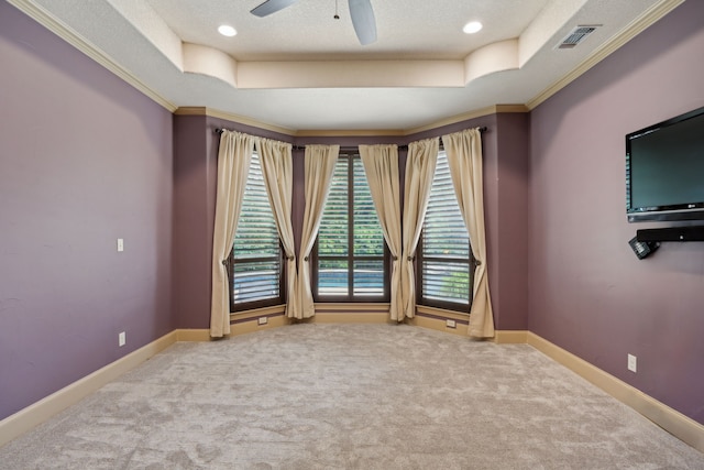 301 Harrison Cir, Van Alstyne, TX 75495 - unfurnished room with a raised ceiling, carpet, ceiling fan, crown molding, and baseboards