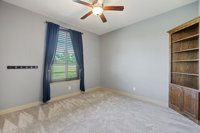 301 Harrison Cir, Van Alstyne, TX 75495 - unfurnished room featuring carpet, a ceiling fan, plenty of natural light, and baseboards