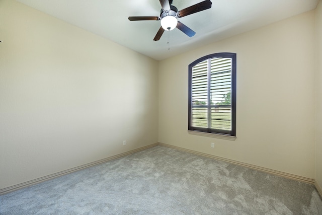 301 Harrison Cir, Van Alstyne, TX 75495 - empty room featuring carpet floors, baseboards, and ceiling fan