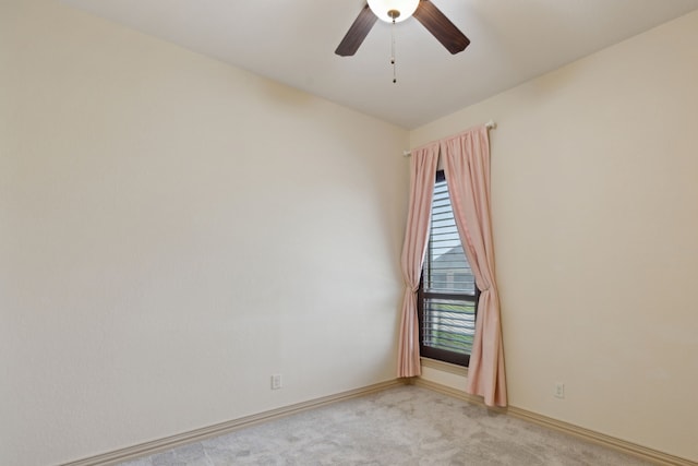 301 Harrison Cir, Van Alstyne, TX 75495 - unfurnished room with light carpet, a ceiling fan, and baseboards