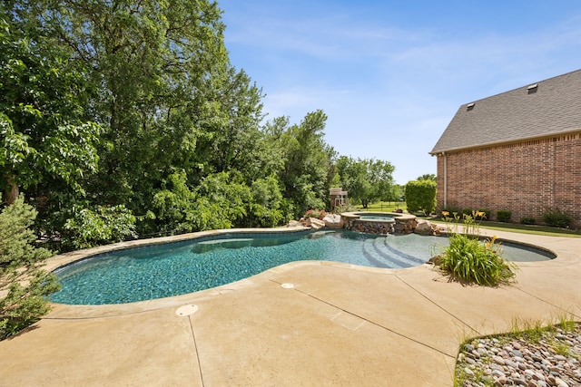 301 Harrison Cir, Van Alstyne, TX 75495 - view of swimming pool featuring a patio area and a pool with connected hot tub