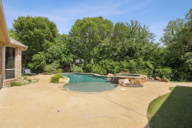 301 Harrison Cir, Van Alstyne, TX 75495 - view of swimming pool featuring a patio and a pool with connected hot tub