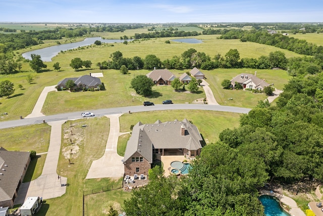 301 Harrison Cir, Van Alstyne, TX 75495 - aerial view of a pool and a large body of water