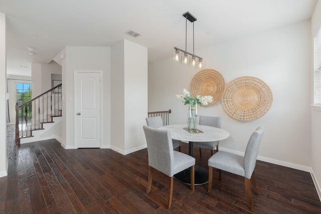 3924 Asbury Ln, Addison, TX 75001 - dining space featuring hardwood / wood-style floors, baseboards, and stairway