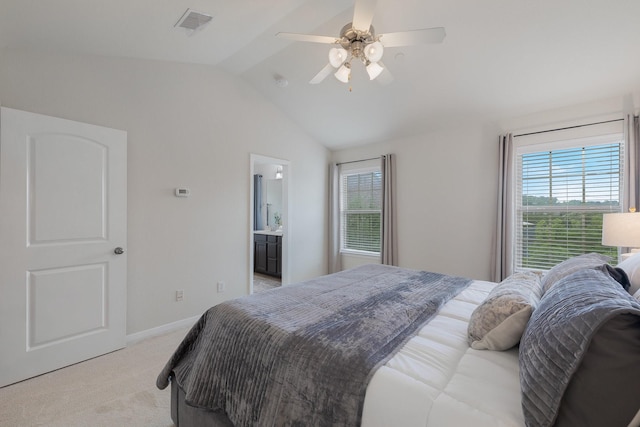 3924 Asbury Ln, Addison, TX 75001 - bedroom with vaulted ceiling, light carpet, multiple windows, baseboards, and ceiling fan