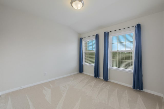 3924 Asbury Ln, Addison, TX 75001 - unfurnished room with light carpet, baseboards, and lofted ceiling