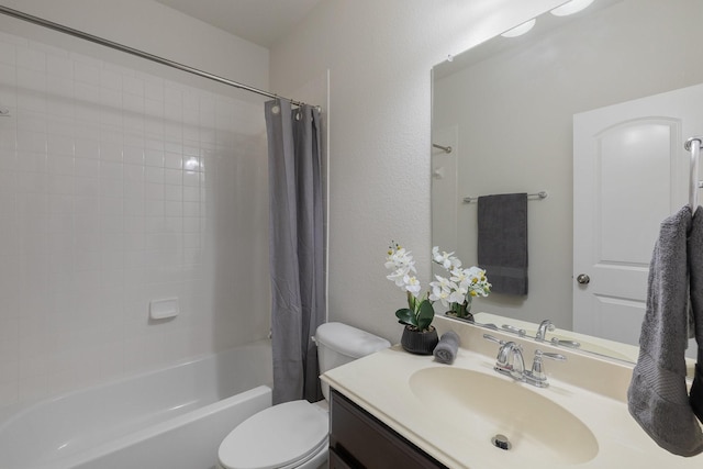 3924 Asbury Ln, Addison, TX 75001 - bathroom with toilet, shower / bath combo, vanity, and a textured wall