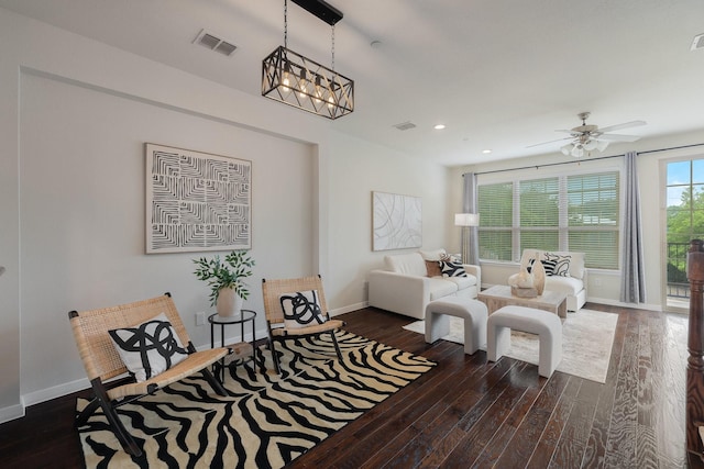 3924 Asbury Ln, Addison, TX 75001 - sitting room with dark wood-style floors, baseboards, recessed lighting, a ceiling fan, and a chandelier