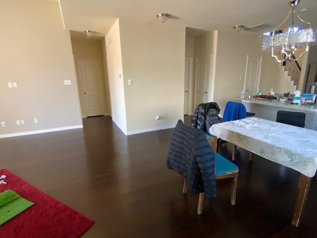 5833 N Silverton Ave, Mckinney, TX 75070 - dining space with a chandelier, baseboards, and wood finished floors