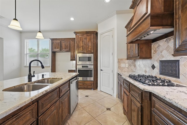 1004 Taylor Dr, Allen, TX 75013 - kitchen featuring appliances with stainless steel finishes, a sink, custom range hood, crown molding, and light stone countertops