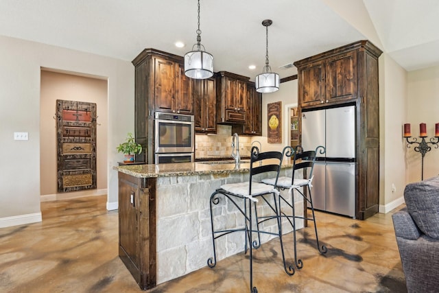 1389 County Road 3591, Paradise, TX 76073 - kitchen featuring appliances with stainless steel finishes, backsplash, recessed lighting, baseboards, and stone countertops
