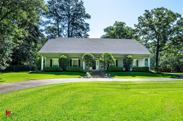 9855 Holamy Ln, Shreveport, LA 71106 - view of front of property featuring curved driveway and stucco siding