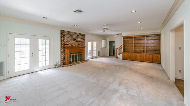 9855 Holamy Ln, Shreveport, LA 71106 - unfurnished living room with crown molding, french doors, carpet flooring, stairway, and a ceiling fan