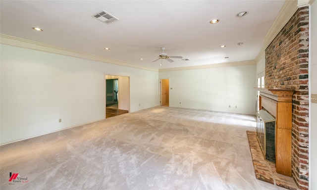 9855 Holamy Ln, Shreveport, LA 71106 - unfurnished living room with ornamental molding, light colored carpet, ceiling fan, recessed lighting, and a brick fireplace