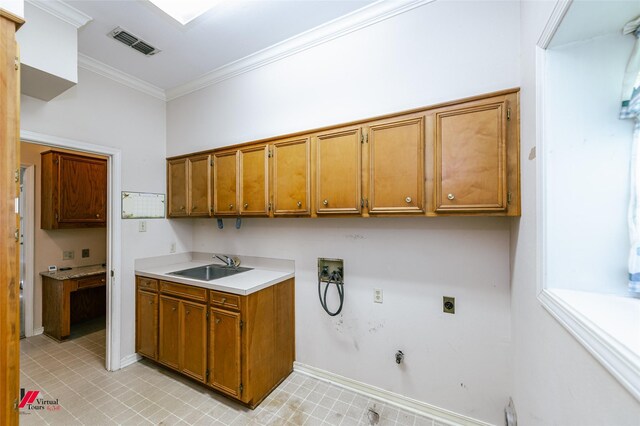 9855 Holamy Ln, Shreveport, LA 71106 - clothes washing area featuring electric dryer hookup, washer hookup, hookup for a gas dryer, cabinet space, and ornamental molding